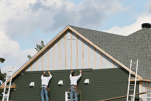 Professional Siding Contractor technician working in Fort Loramie, OH